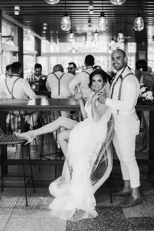 Black and white photo of a bride dancing