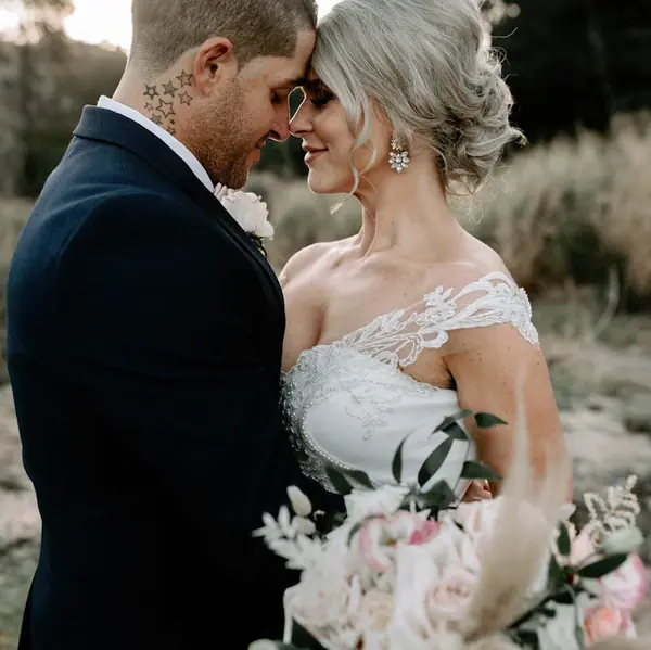 Bride and groom forehead to forehead