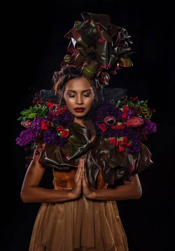 Floral headpiece editorial with eyes closed