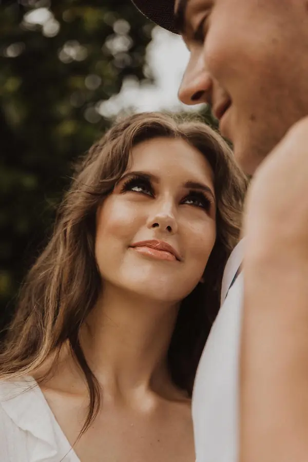 Model gazing up at her partner