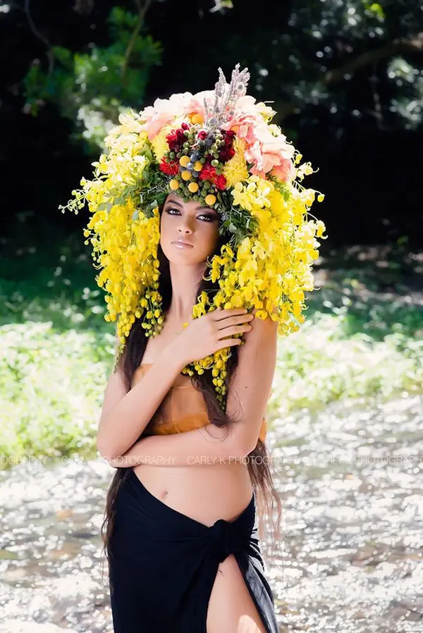 Model wearing a tropical floral headdress