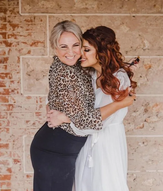 Carly with a bride on the wedding morning