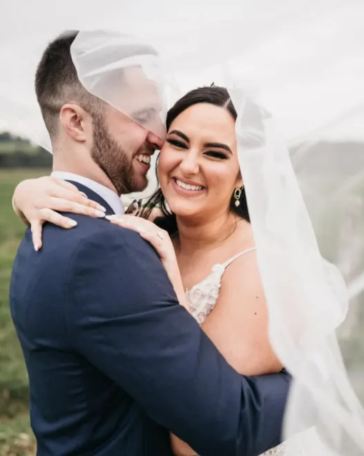 Katie and her husband on their wedding day